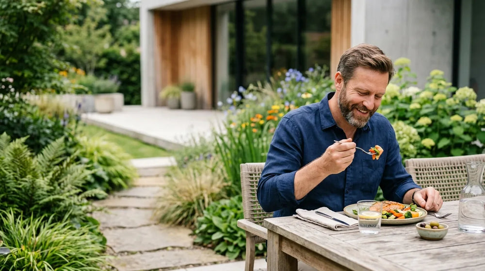 man eating meal in garden