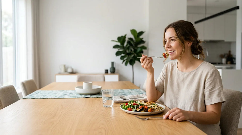 woman eating meal in dining room